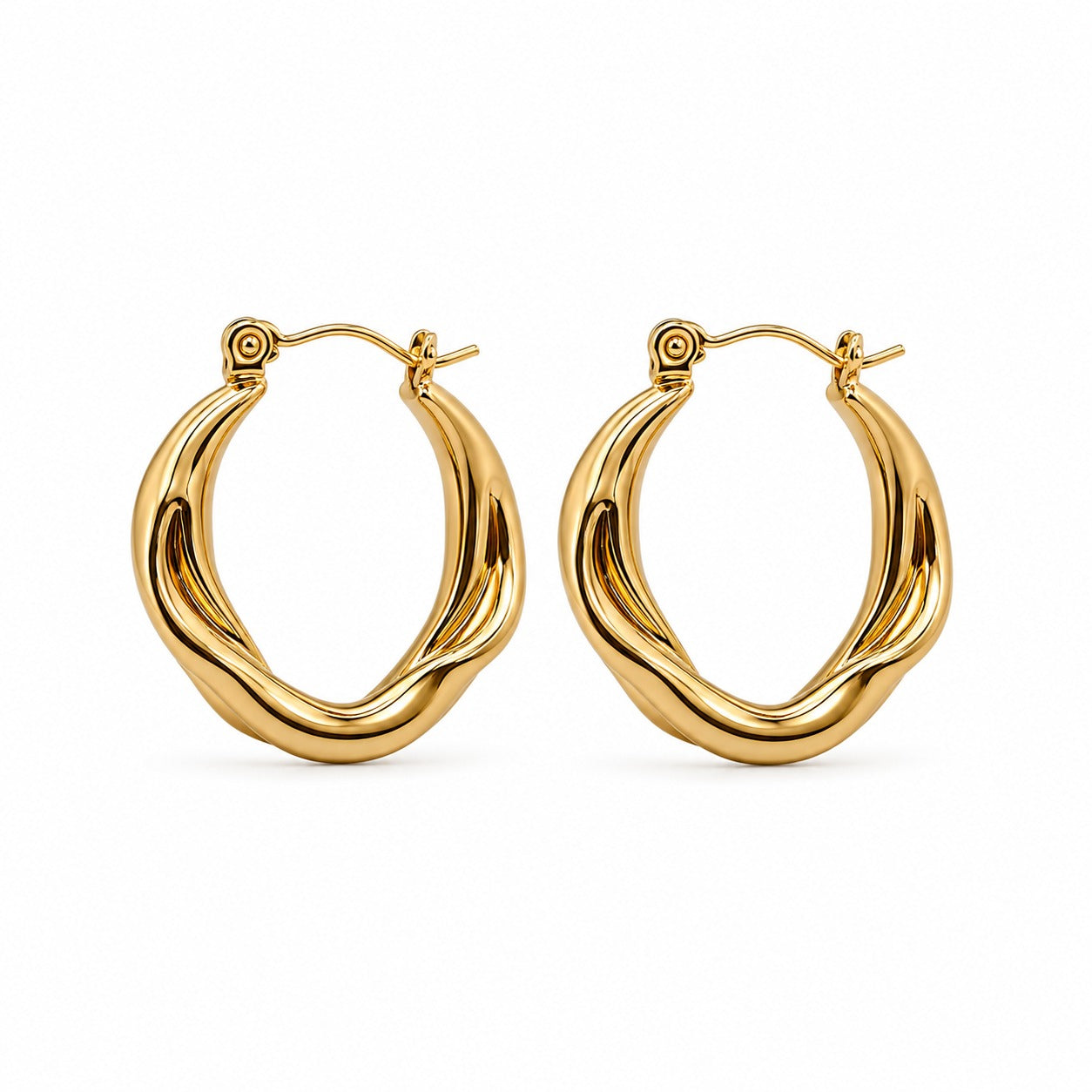 A pair of gold-toned twisted hoop earrings with a polished finish, displayed on a clean white background.