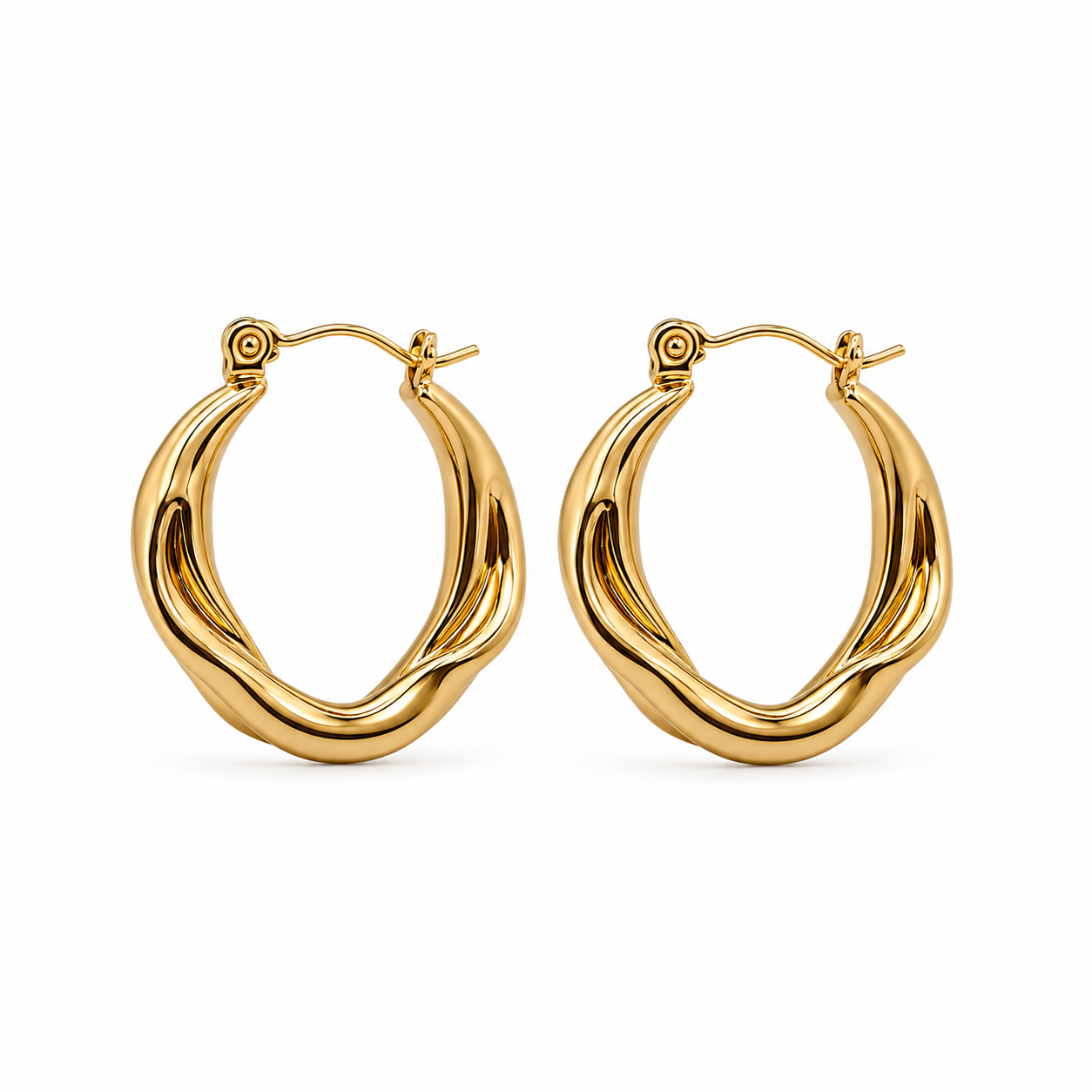 A pair of polished gold hoop earrings with a twisted, organic wavy design, displayed on a clean white background.
