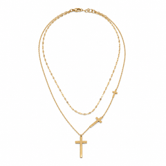 A gold double-layer necklace featuring a classic cable chain and a delicate cable chain with three small cross pendants, including one larger polished cross at the bottom center.