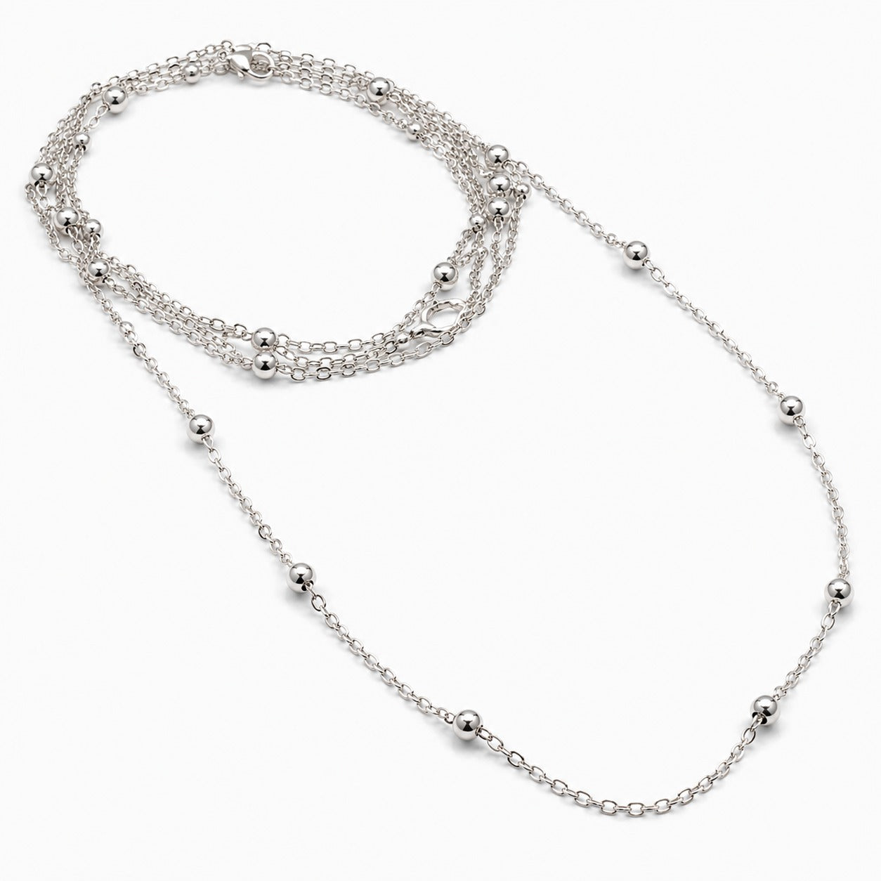 A multi-strand silver chain necklace with small polished bead accents, displayed on a clean white background.