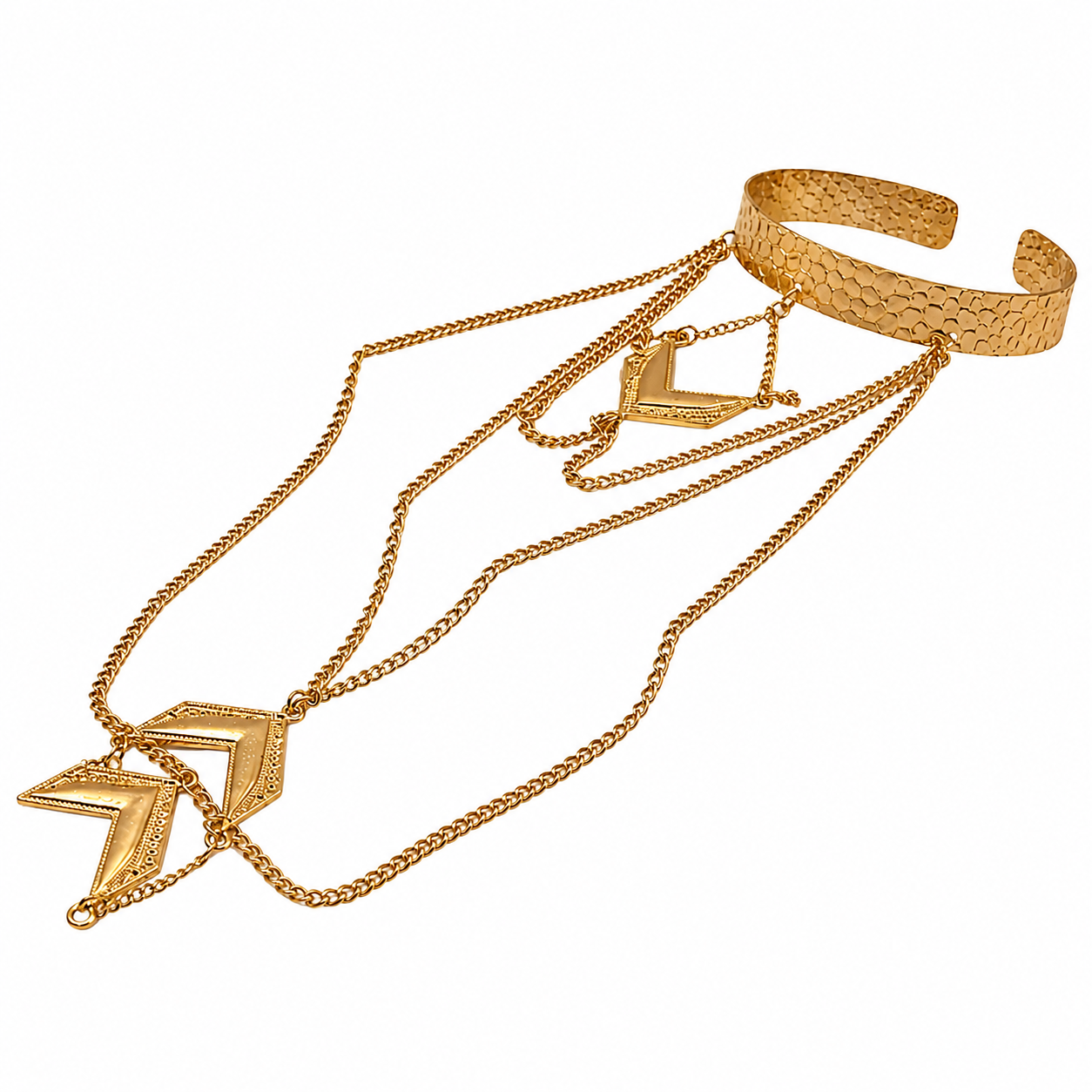 A gold-toned multi-layered necklace set featuring a textured hammered cuff bracelet, a large chevron pendant, a smaller matching chevron charm, and a fine chain draped over a delicate chain on a white background.