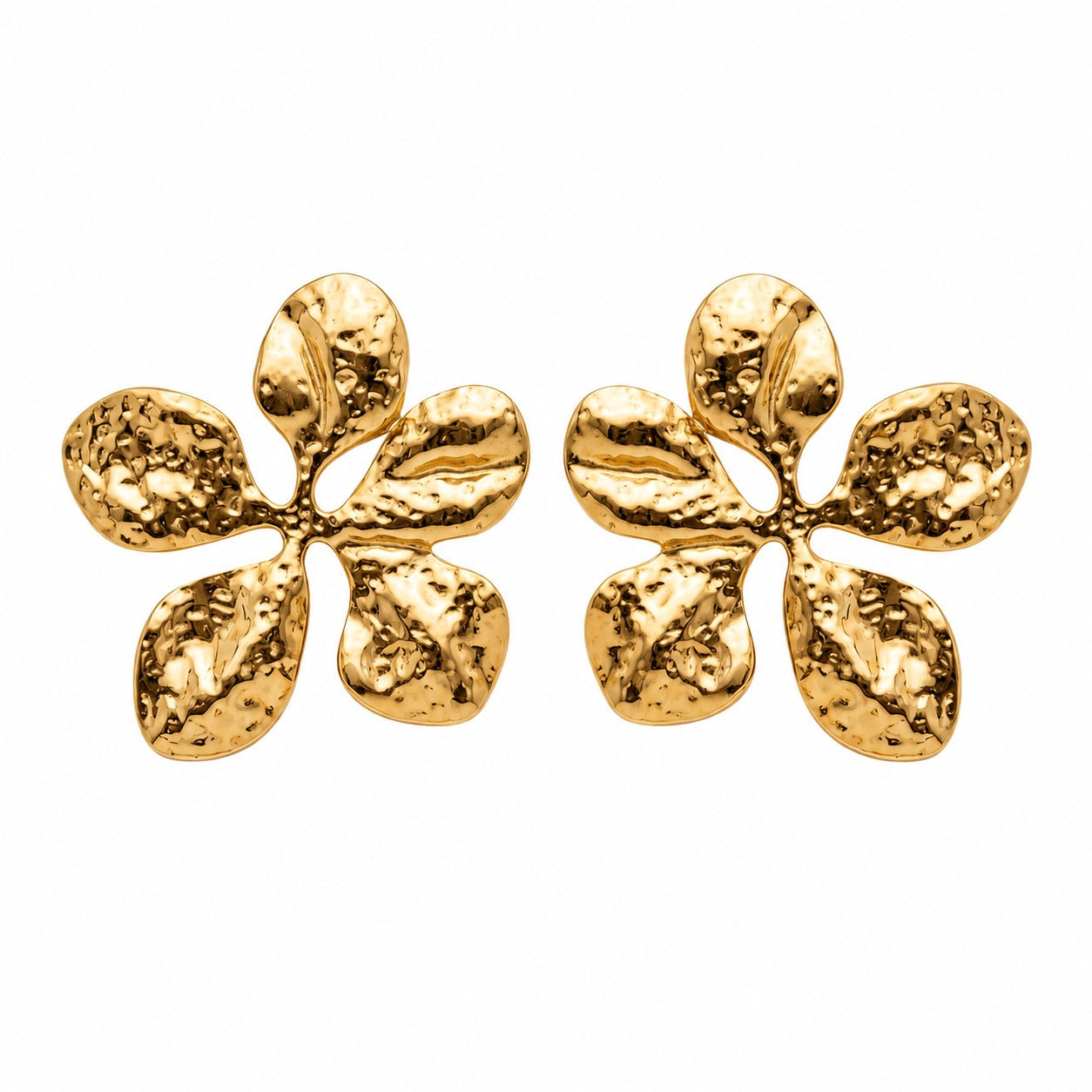 A pair of textured gold flower-shaped stud earrings on a plain white background.
