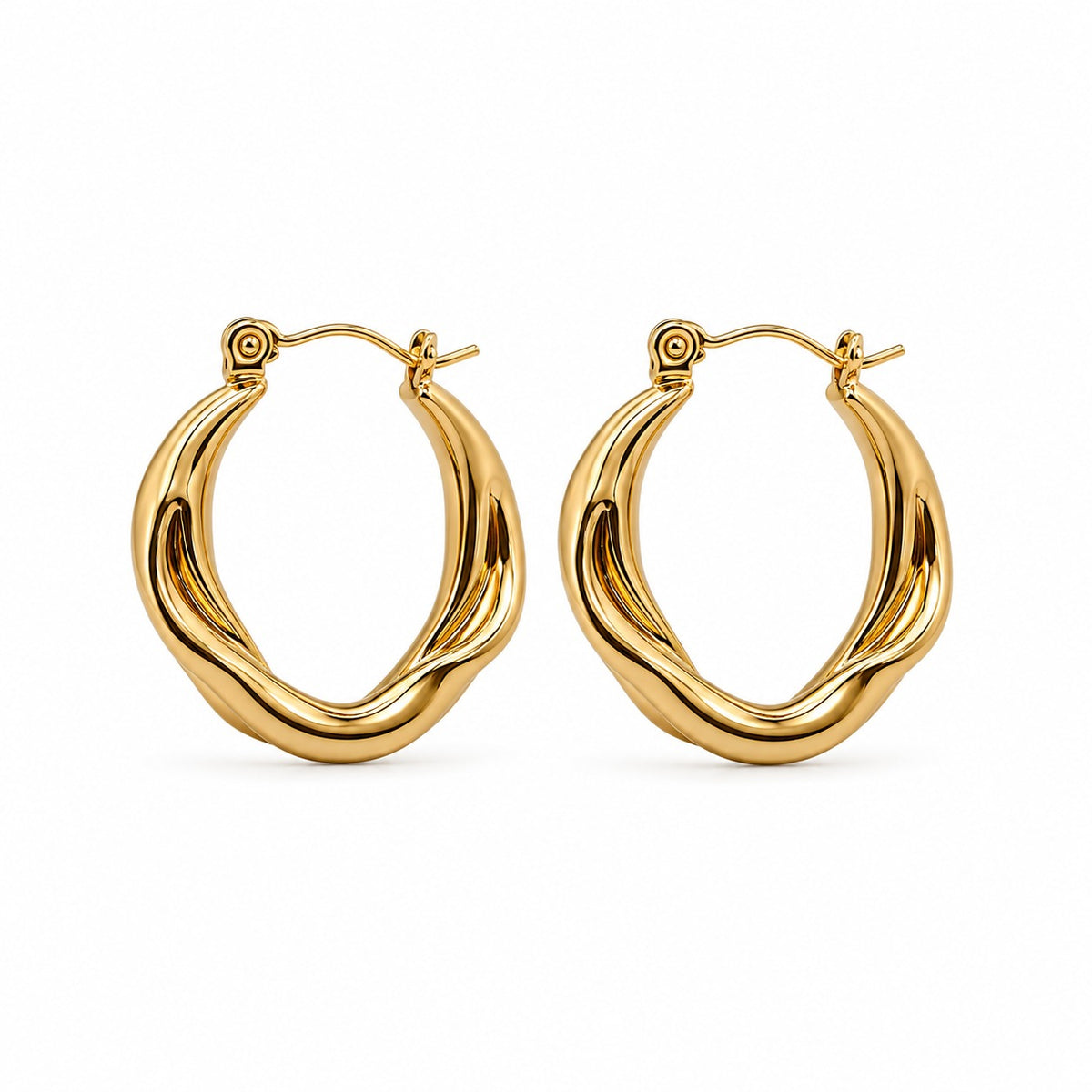 A pair of gold-toned twisted hoop earrings with a polished finish, displayed on a clean white background.