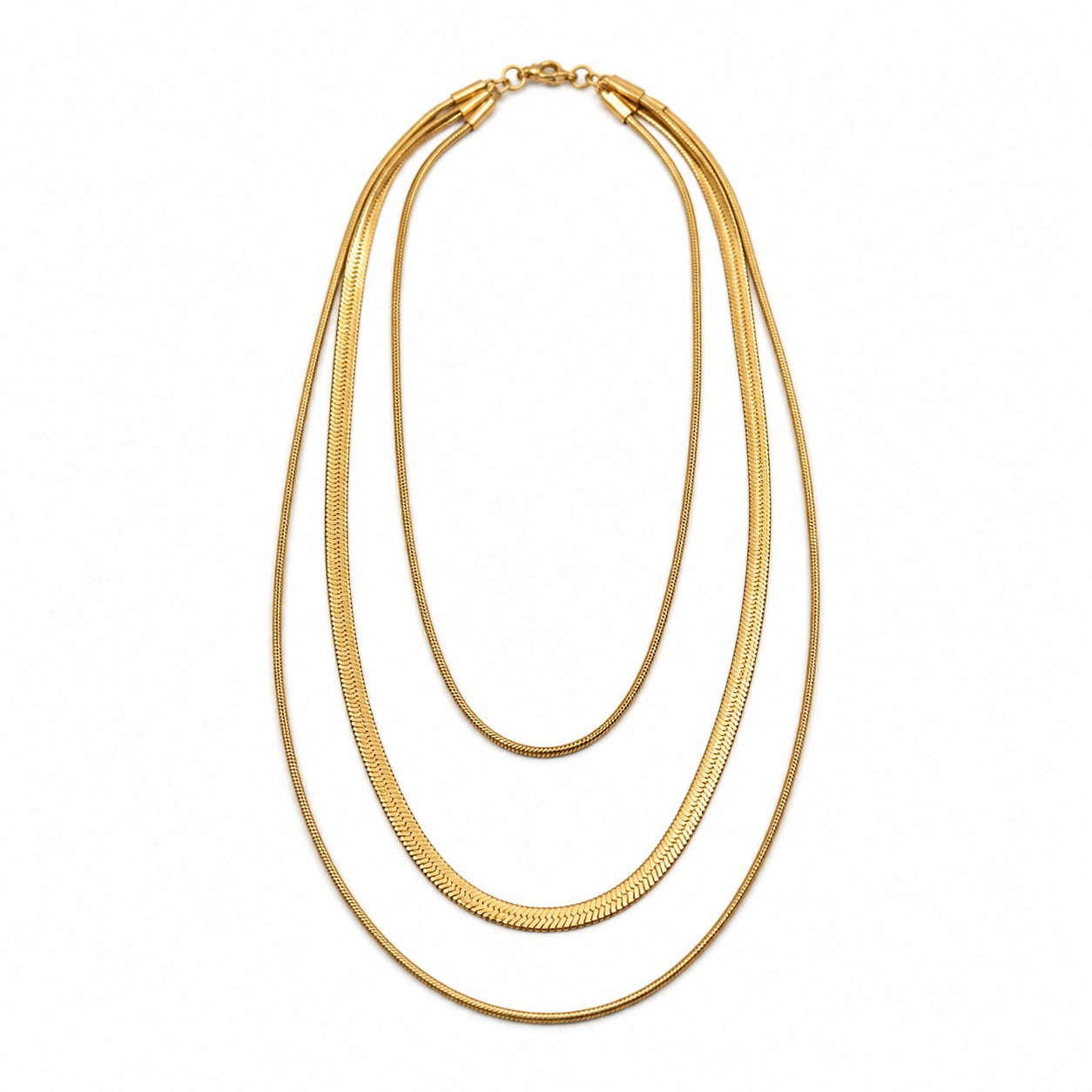 A gold-toned multi-strand snake chain necklace with three layered strands and a small clasp at the top, shown on a plain white background.