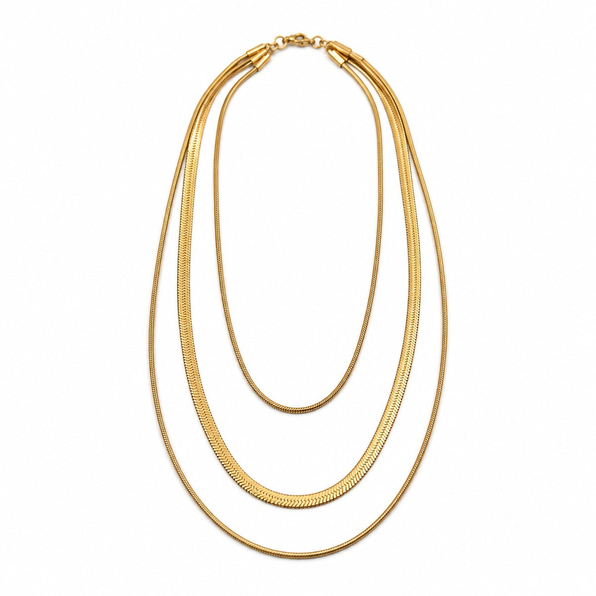 A gold-toned multi-strand snake chain necklace with three layered strands and a small clasp at the top, shown on a plain white background.