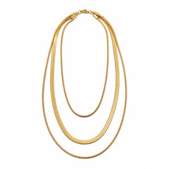 A gold-toned multi-strand snake chain necklace with three layered strands and a small clasp at the top, shown on a plain white background.