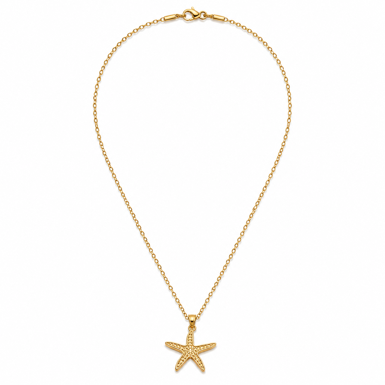 A delicate gold chain necklace featuring a small starfish pendant, displayed against a solid white background.