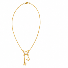 A delicate gold chain necklace featuring a butterfly-shaped pendant with two dangling key charms, displayed on a clean white background.