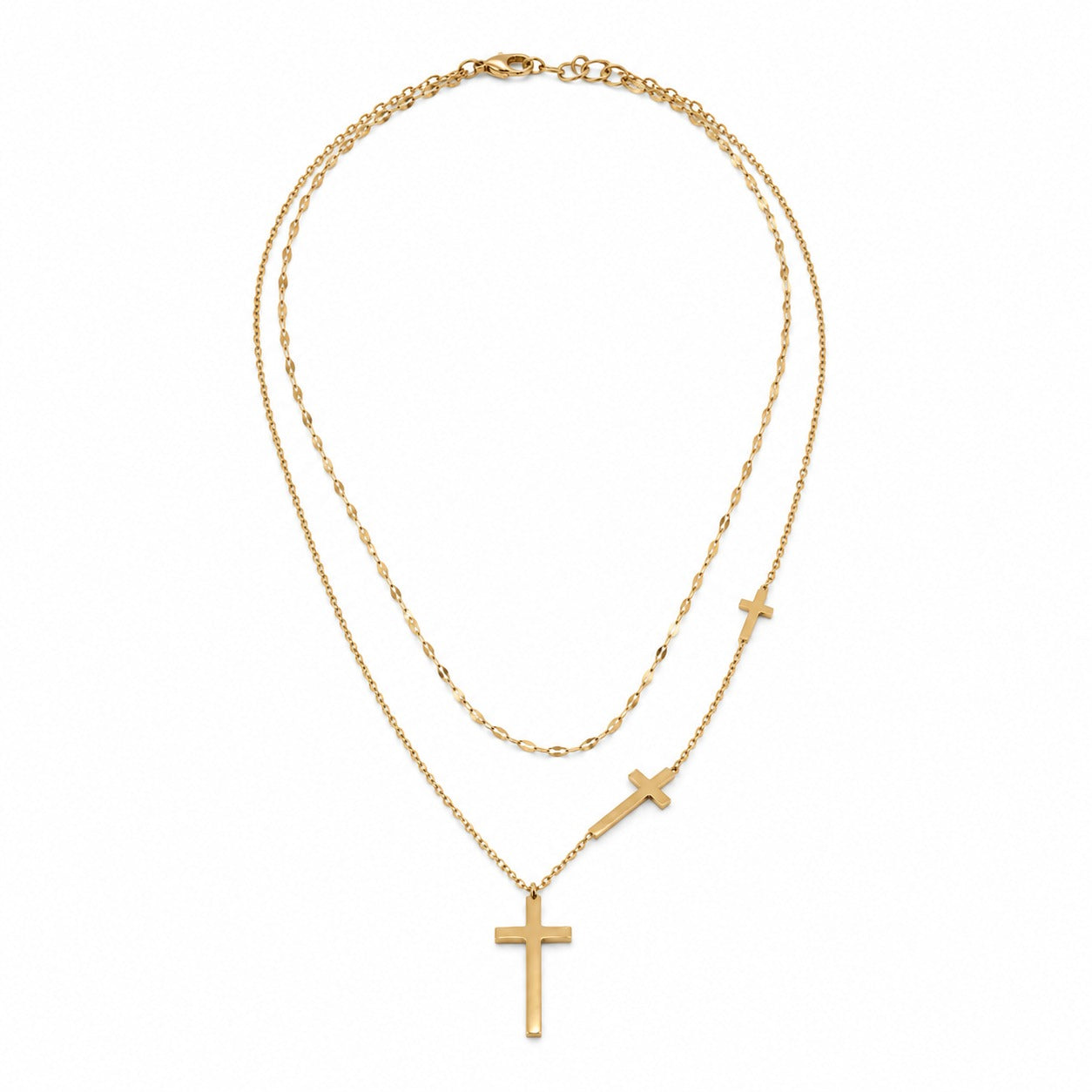 A double-layered gold necklace featuring a classic cable chain and a finer cable chain with three small cross pendants, displayed on a clean white background.