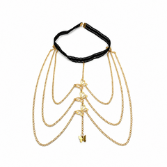 A gold and black beaded choker necklace with cascading gold chains and butterfly charms, displayed on a clean white background.